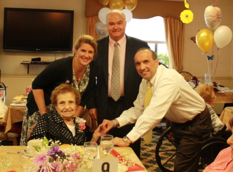 Monmouth County Freeholders Serena DiMaso, John P. Curley and Thomas A. Arnone join Bea Rossi (front), 100, of Freehold, at the Centenarian Birthday Party on May 7, 2014 in Hazlet, NJ.